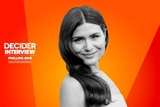 Phillipa Soo in black and white on a bright orange background