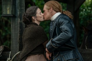 Claire (Caitriona Balfe) and Jamie (Sam Heughan) kissing in 'Outlander' Season 7 B